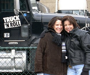 Me and my sis posing in front of Bruce's grossly fuel inefficient equipment truck